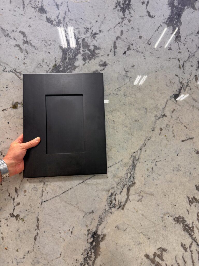 Mona Lisa granite slab with dramatic natural patterns and warm tones